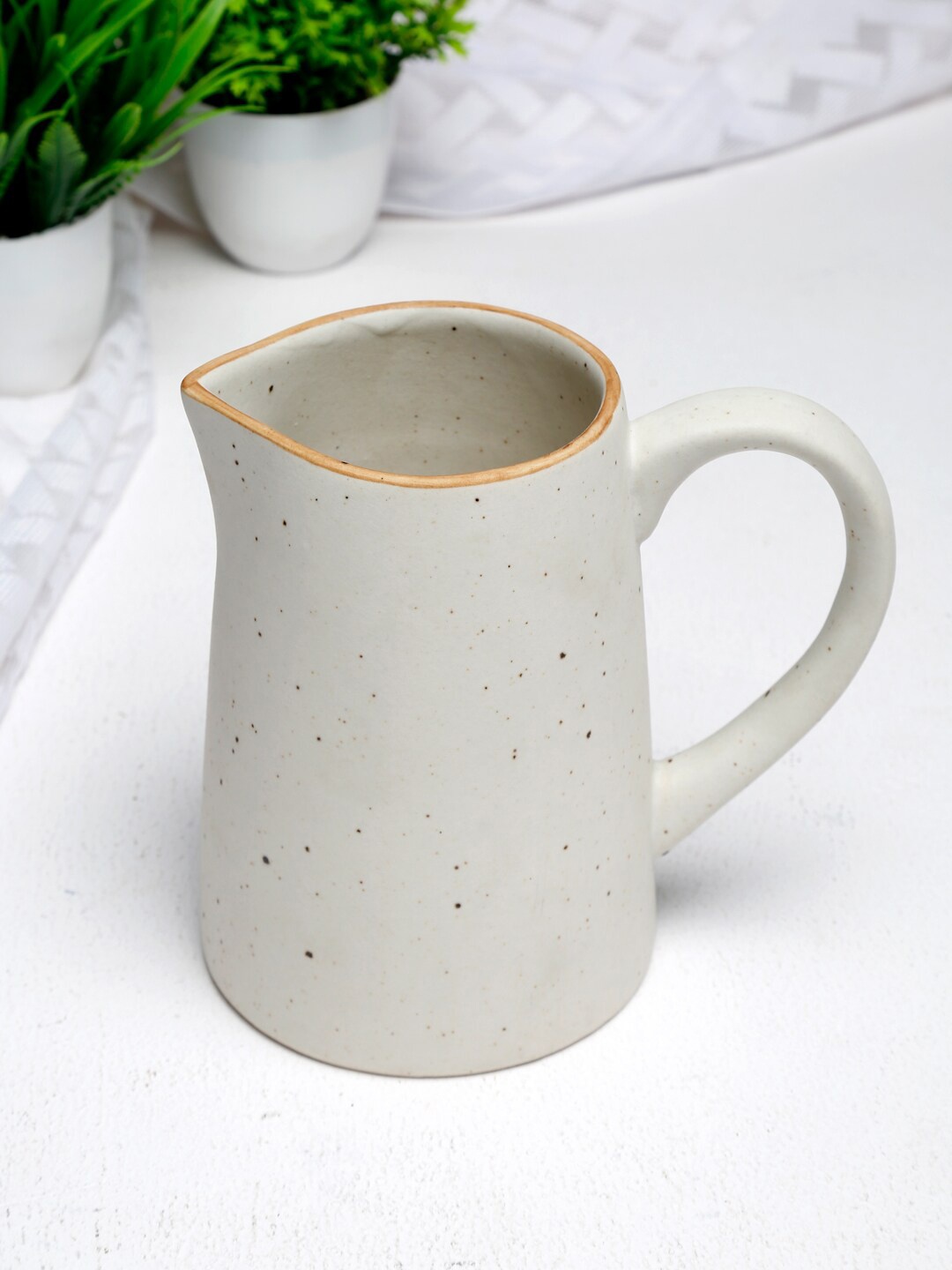 

Fabindia Off-White Ceramic Kadir Glazed Medium Jug