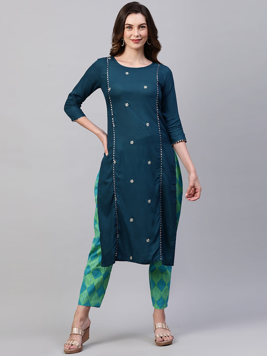

Indo Era Women Teal Green Ethnic Motifs Embroidered Straight Kurta with Trousers