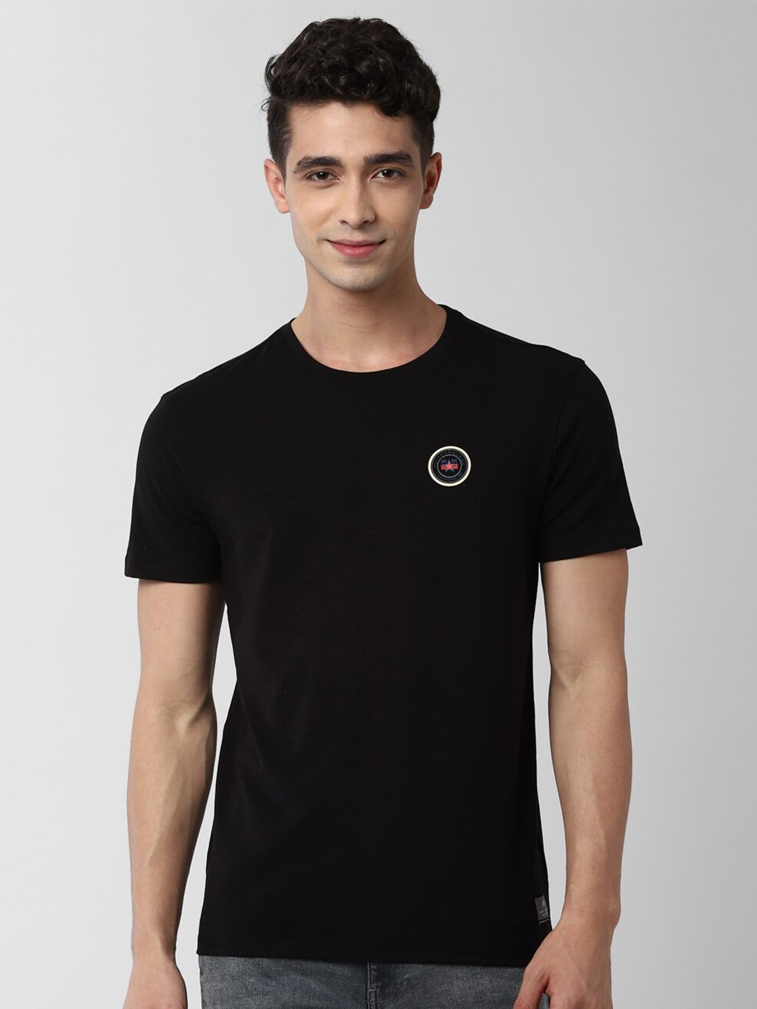 

Peter England Casuals Men Black Slim Fit T-shirt
