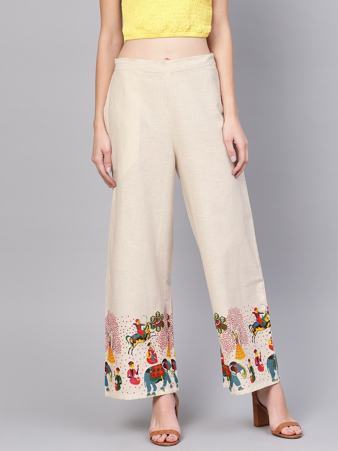 

Yuris Women Off White & Red Ethnic Motifs Hem Design Palazzos