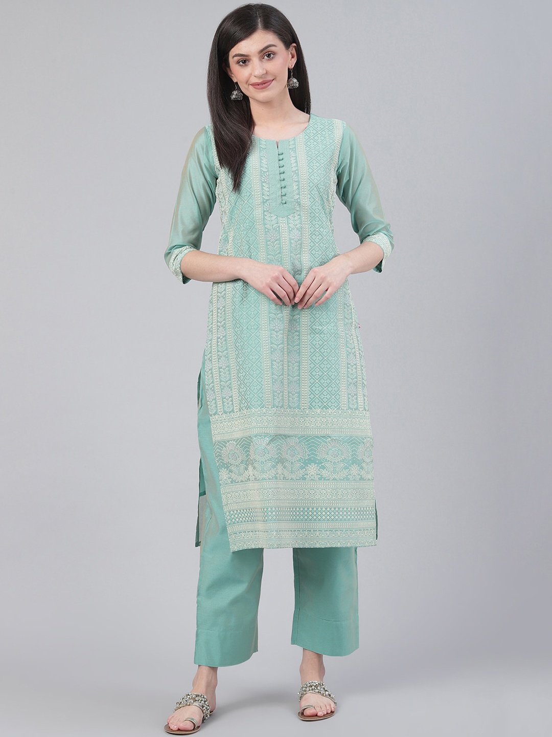 

Varanga Women Sea Green Floral Embroidered Chanderi Silk Kurta with Trousers