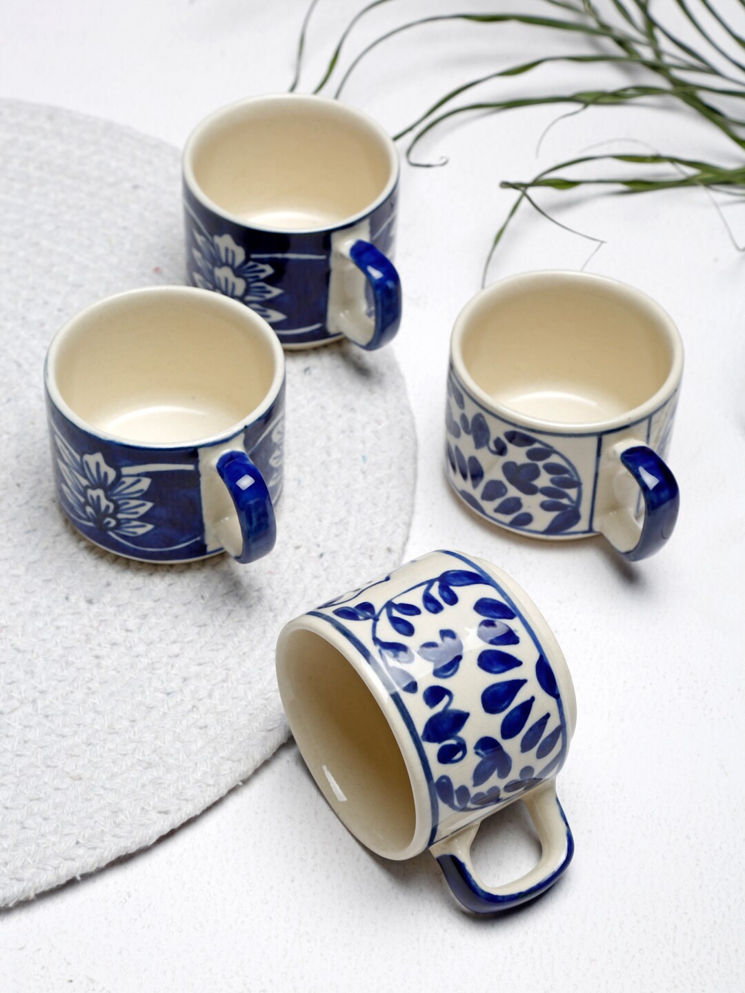 

Fabindia Set Of 4 Blue & White Ethnic Motifs Printed Ceramic Glossy Mugs