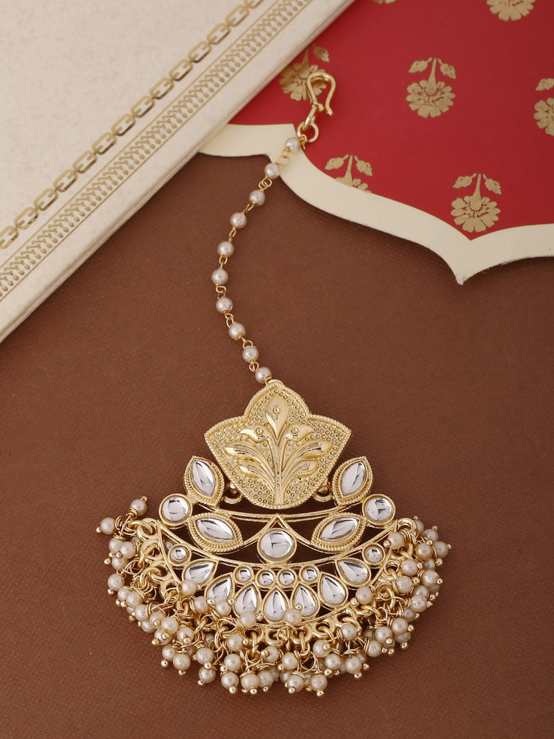 

Shoshaa Gold-Plated White Stone-Studded & Beaded Handcrafted Maang Tikka