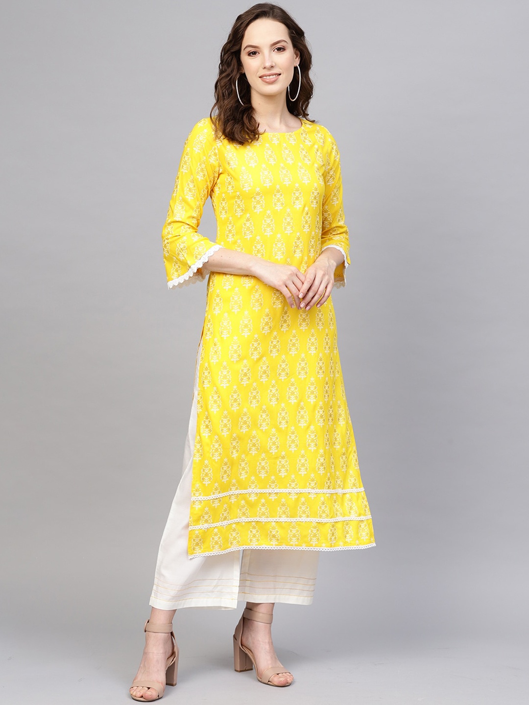 

Indo Era Women Yellow Ethnic Motifs Printed Kurta with Palazzos