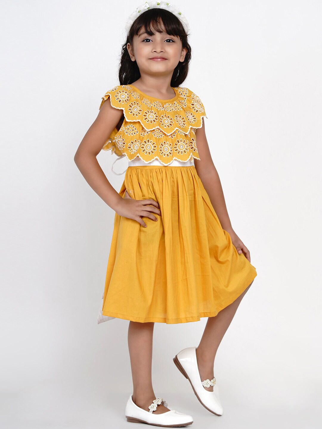 

Bitiya by Bhama Girls Mustard Yellow Schiffli Dress
