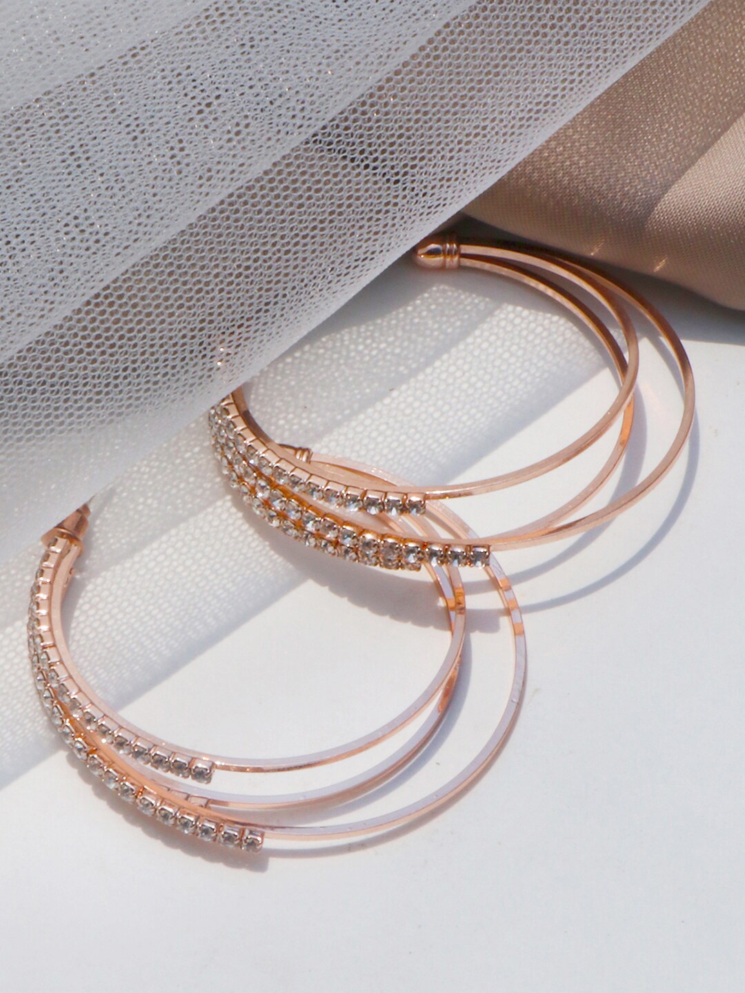 

JOKER & WITCH Rose Gold Contemporary Half Hoop Earrings