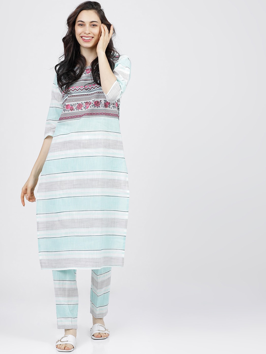 

Vishudh Women Turquoise Blue Striped Straight Kurta, Cream