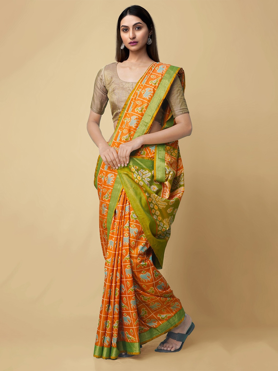 

Unnati Silks Orange & Green Woven Design Zari Art Silk Patola Saree
