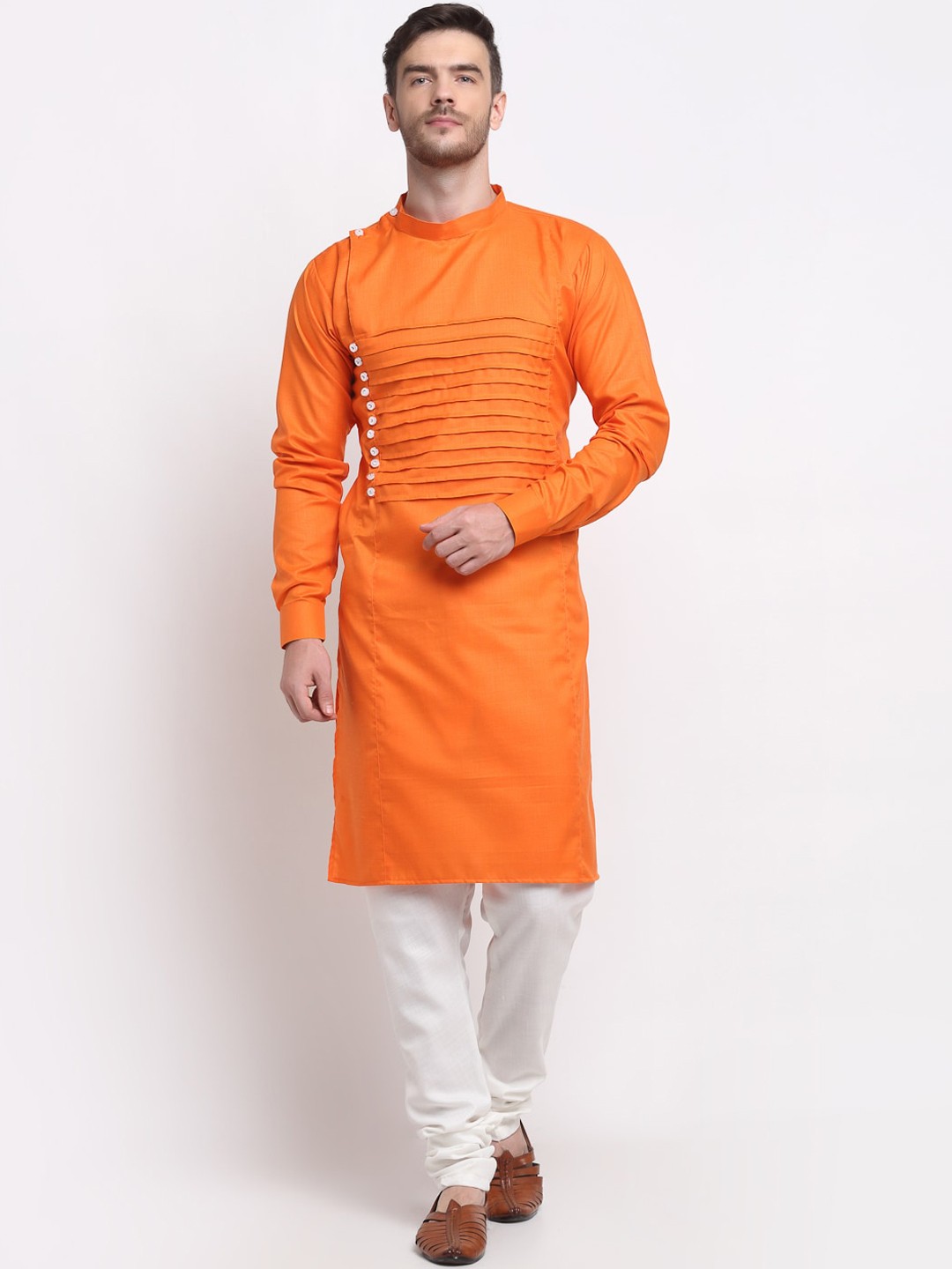 

Benstoke Men Orange Solid Kurta with Churidar
