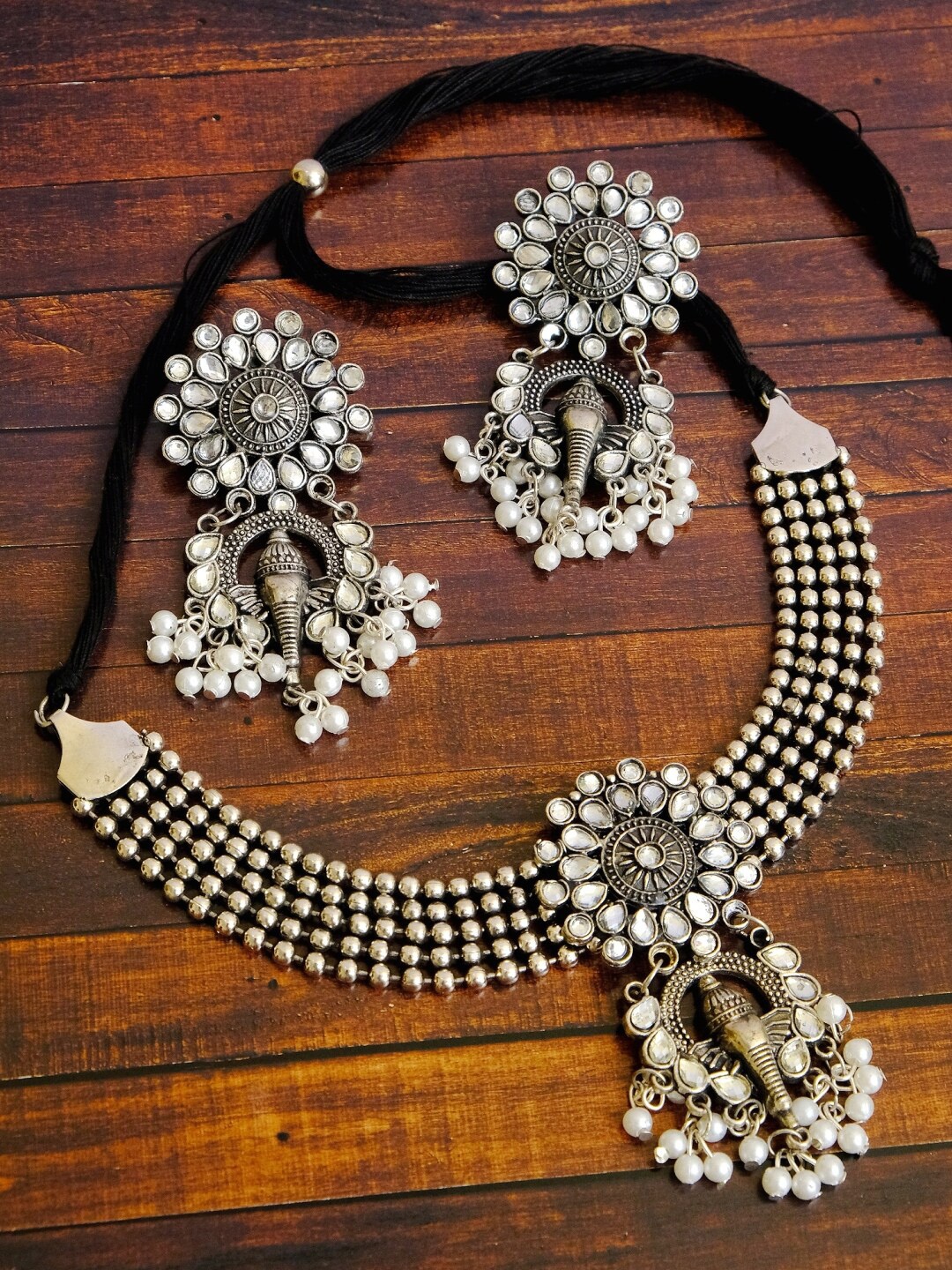 

Crunchy Fashion Oxidised Silver-Plated Statement Elephant Shape Temple Jewellery Set