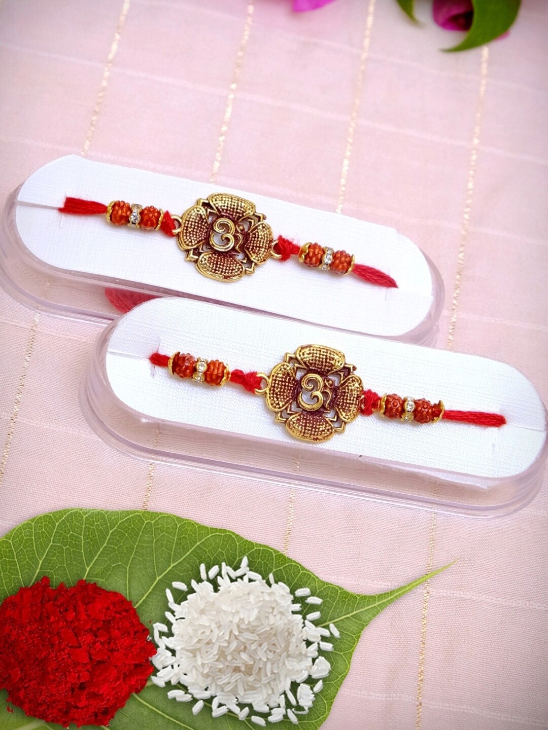 

Crunchy Fashion Set of 2 Gold-Plated Om Fancy Rakhi