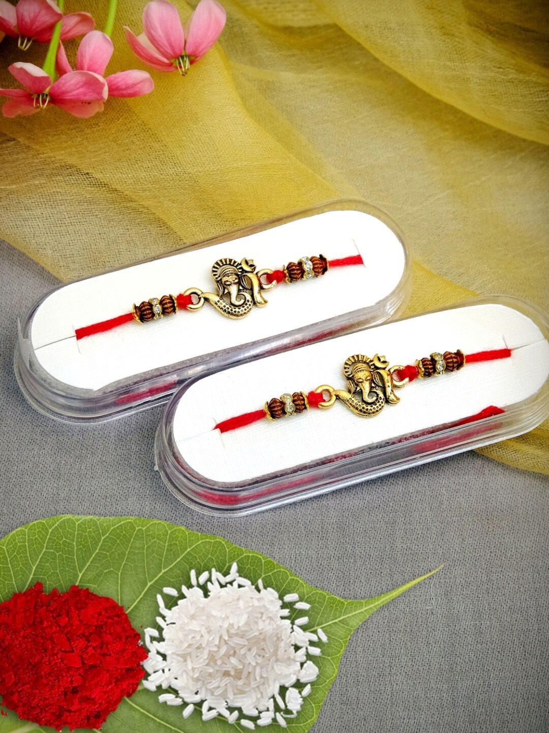 

Crunchy Fashion Gold Set of 2 Fancy Ganpati Rakhi