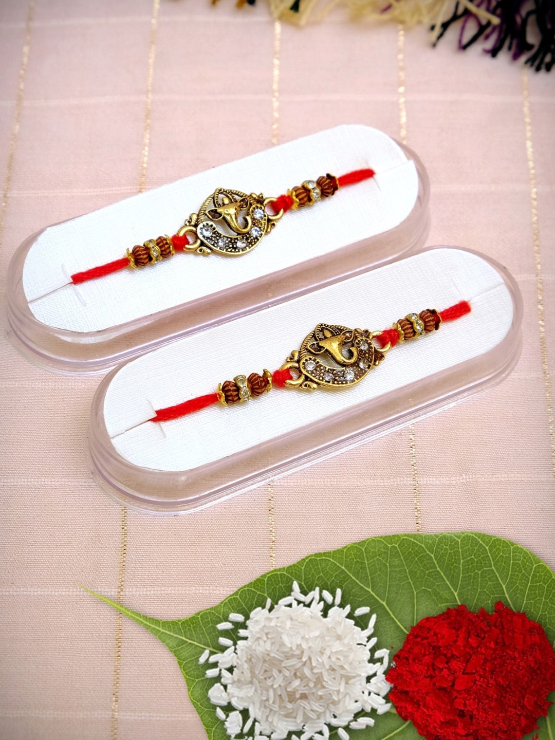 

Crunchy Fashion Pack of 2 Fancy Lord Ganesha Gold Plated Form of Pendant Rakhi
