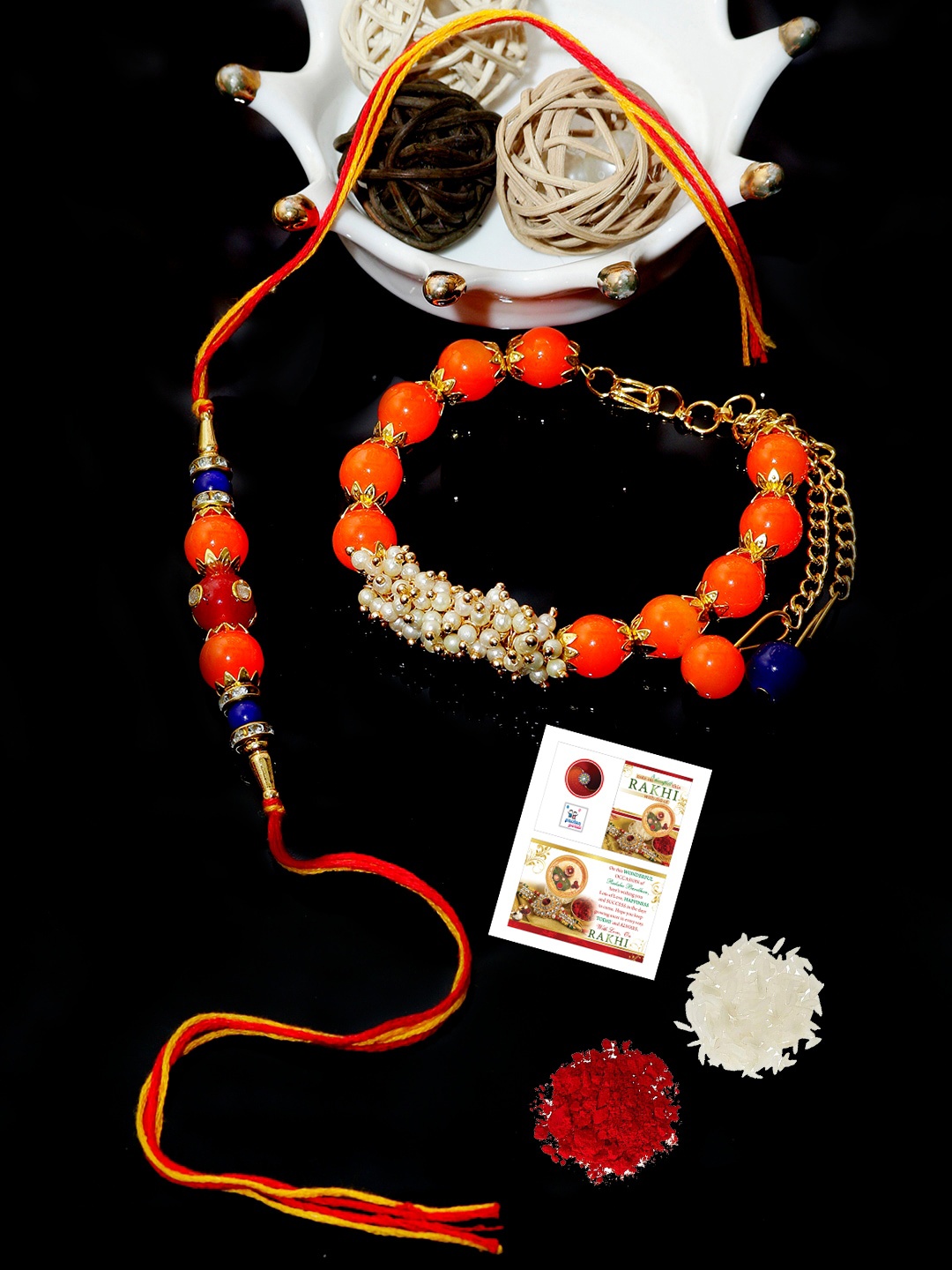 

PASSION PETALS Orange Rakhi Set with Card & Roli Chawal