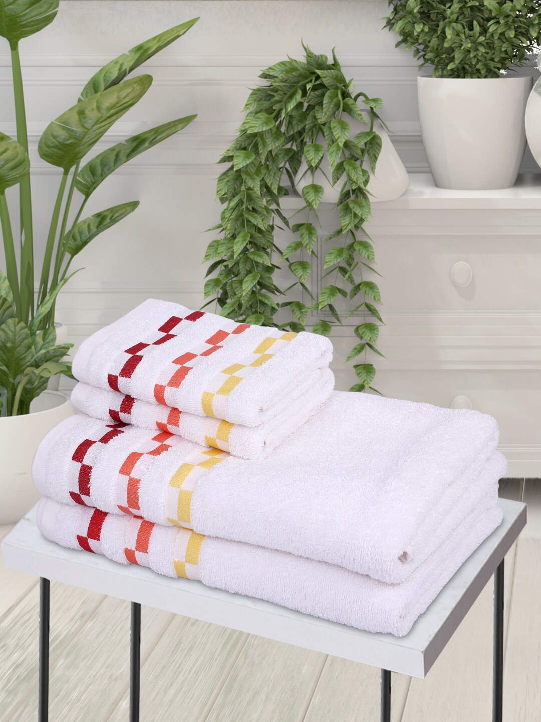 

BIANCA Set Of 4 White Solid 450 GSM Pure Mercerized Combed Cotton Towels