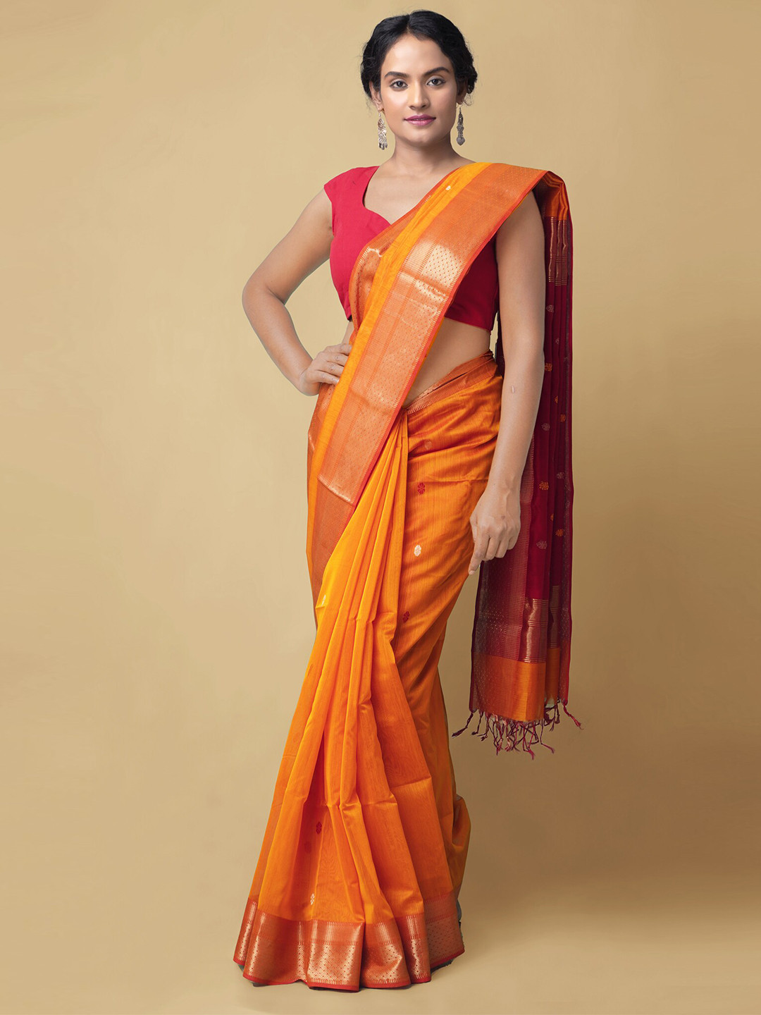 

Unnati Silks Orange & Golden Ethnic Motifs Zari Silk Cotton Maheshwari Handloom Saree