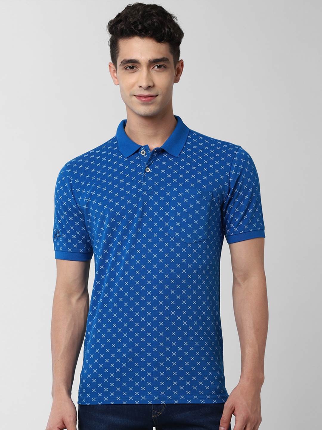 

Peter England Casuals Men Blue & White Printed Polo Collar T-shirt