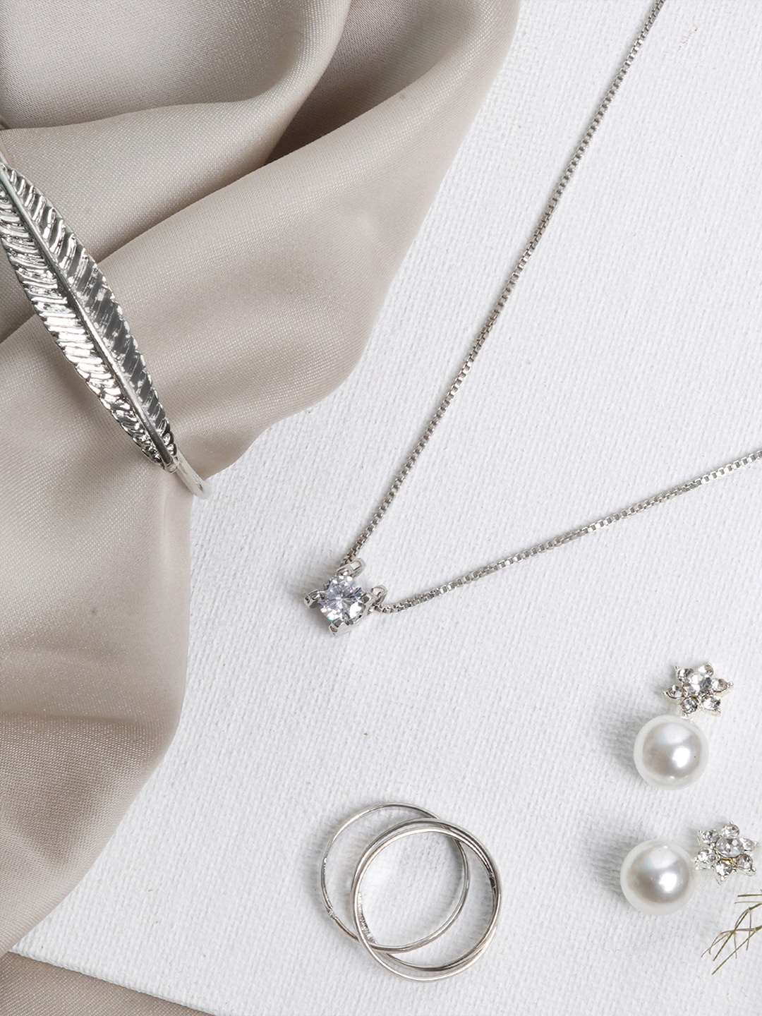 

JOKER & WITCH Women Silver-Toned & White Pearl Studded Elliptical Elegance Jewellery Set