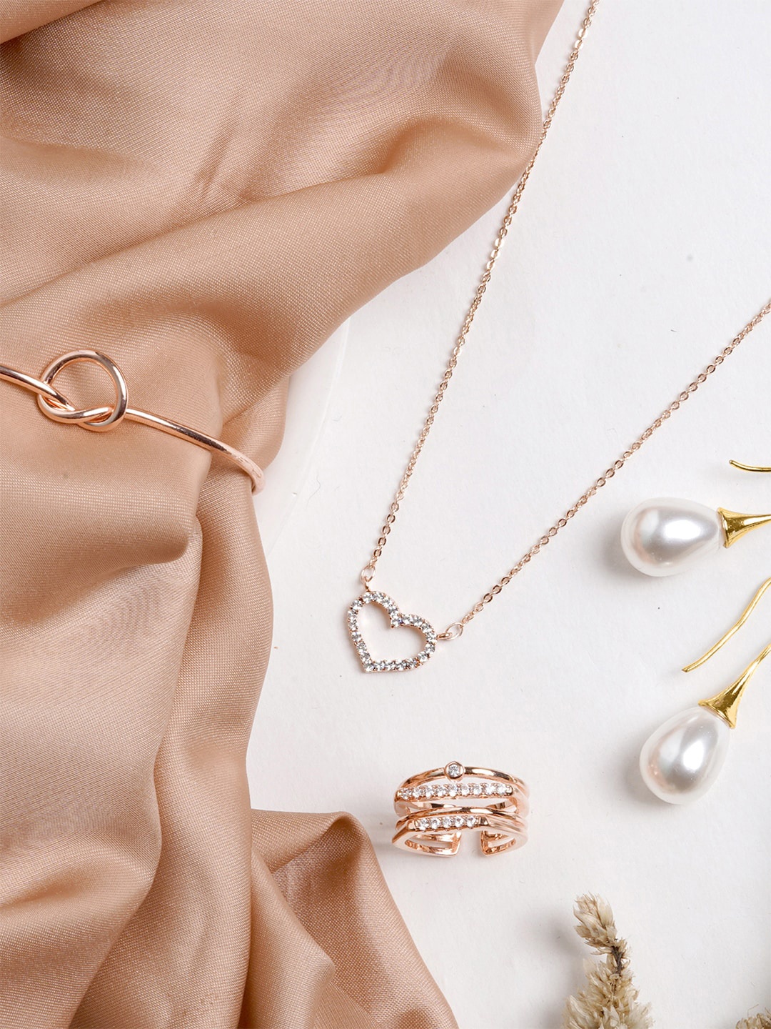 

JOKER & WITCH Women Rose Gold-Toned & White Stone-Studded & Beaded Imperial Jewellery Set