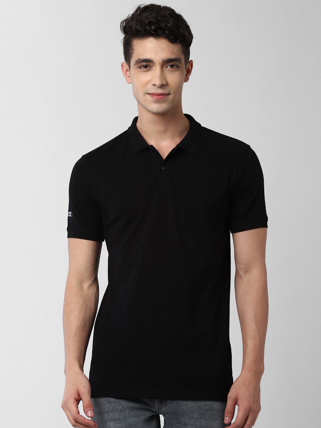 

Peter England Casuals Men Black Polo Collar Slim Fit T-shirt