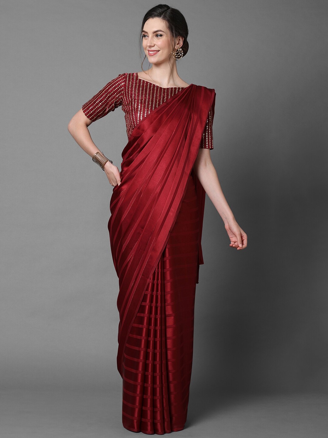 

Mitera Red & Gold-Toned Saree