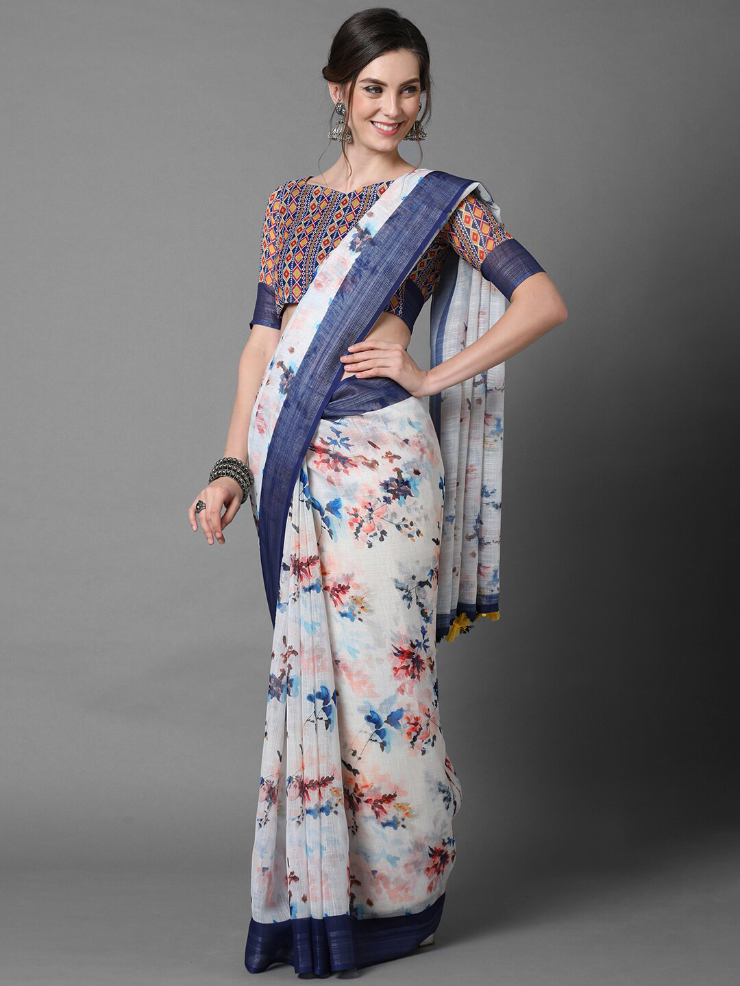 

Mitera White & Blue Floral Linen Blend Saree