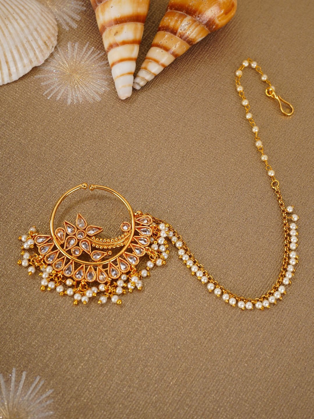 Priyaasi Gold-Plated & White Kundan-Studded Pearl Beaded Chained Bridal Nose Pin