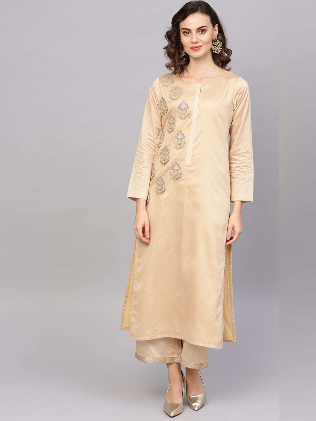 

Indo Era Women Beige Ethnic Motifs Embroidered Thread Work Kurta with Palazzos