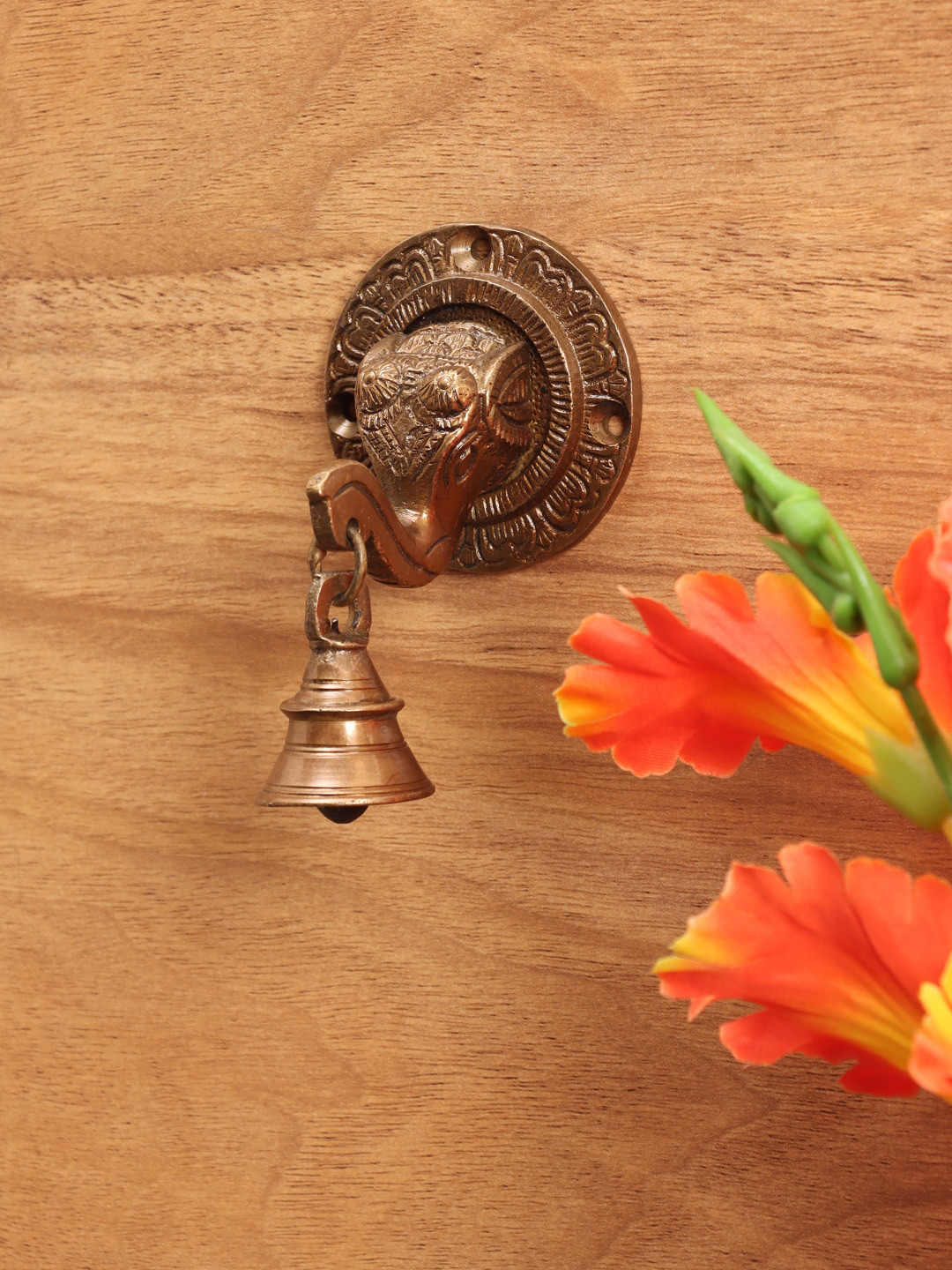 

Aapno Rajasthan Brown Elephant Face Carved Brass Wall Bell