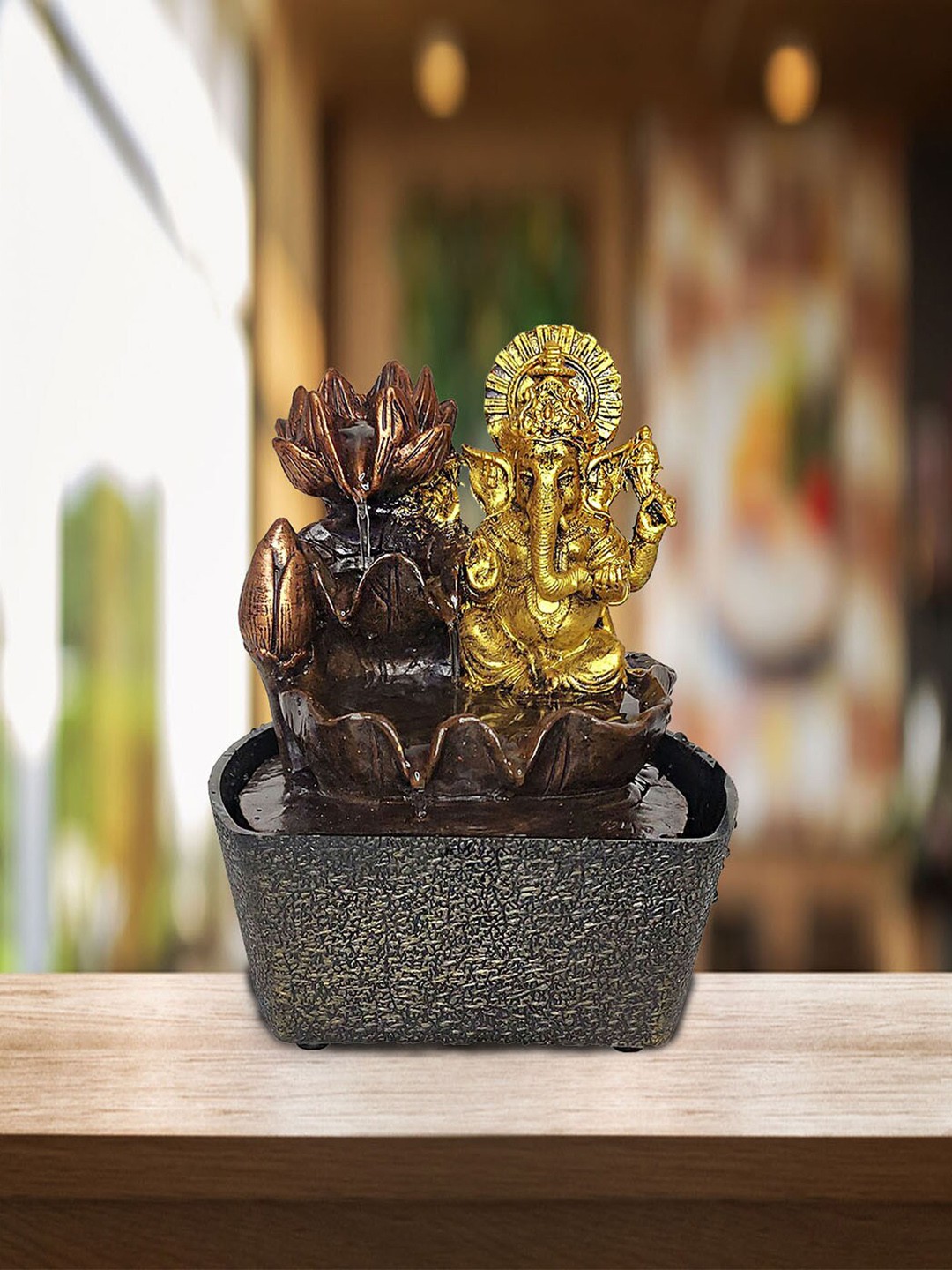 

Wonderland Gold-Coloured & Black Lord Ganesha Resin Fountain