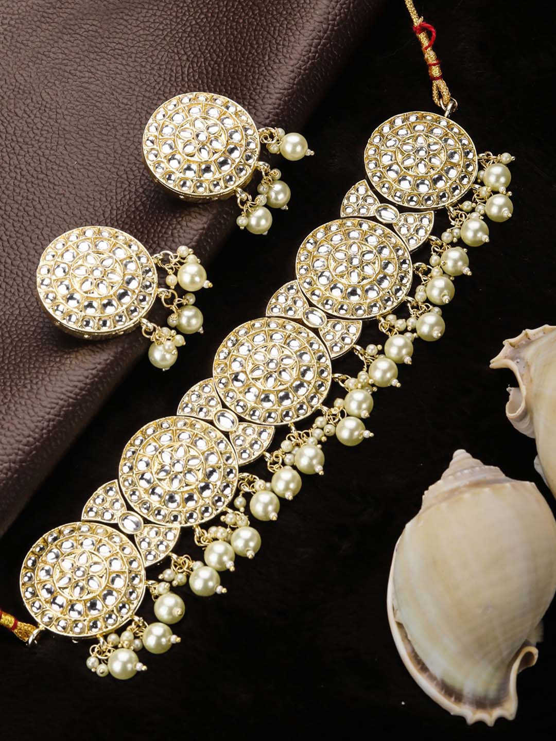 

Priyaasi Gold-Plated White Stone-Studded & Beaded Handcrafted Jewellery Set