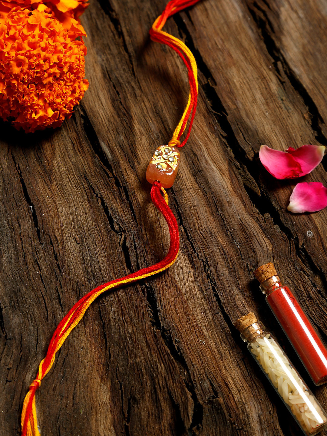 

Ruby Raang Men Red & Peach Kundan Rakhi Gift Box