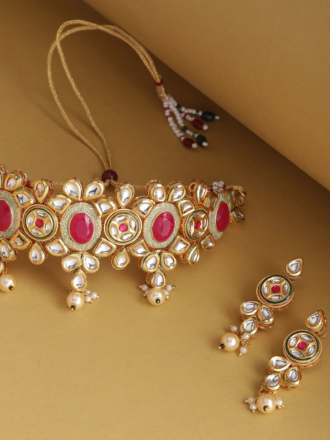 

Priyaasi Gold-Plated White & Magenta Pink Kundan-Studded Beaded Enameled Handcrafted Jewellery Set