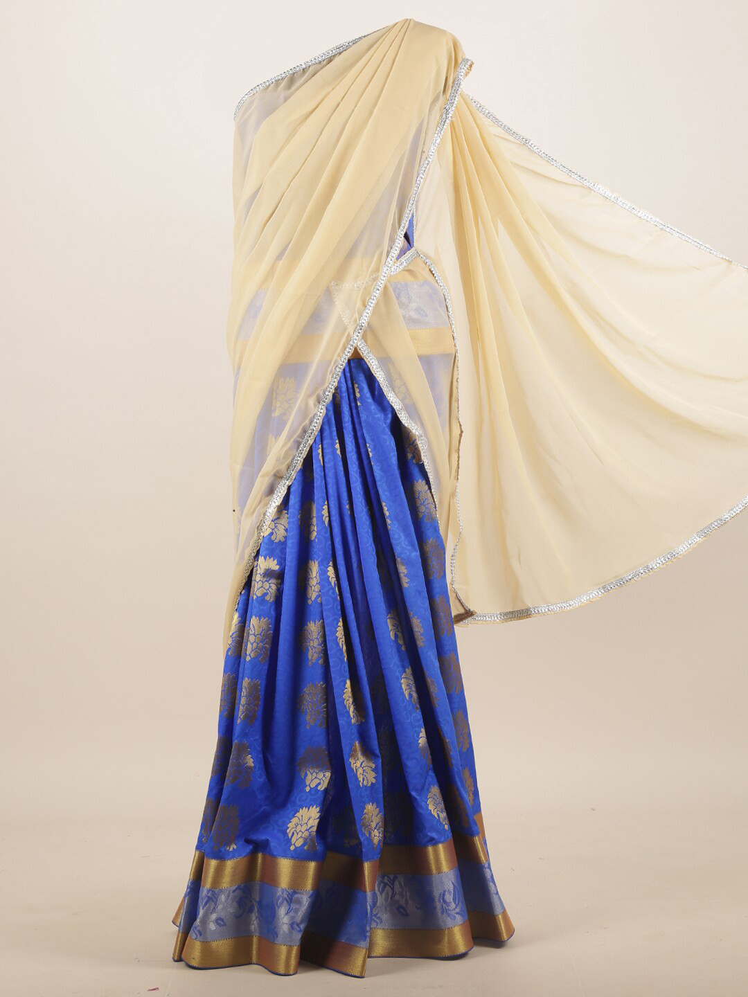 

Pothys Cream & Blue Woven Design Zari Half Saree