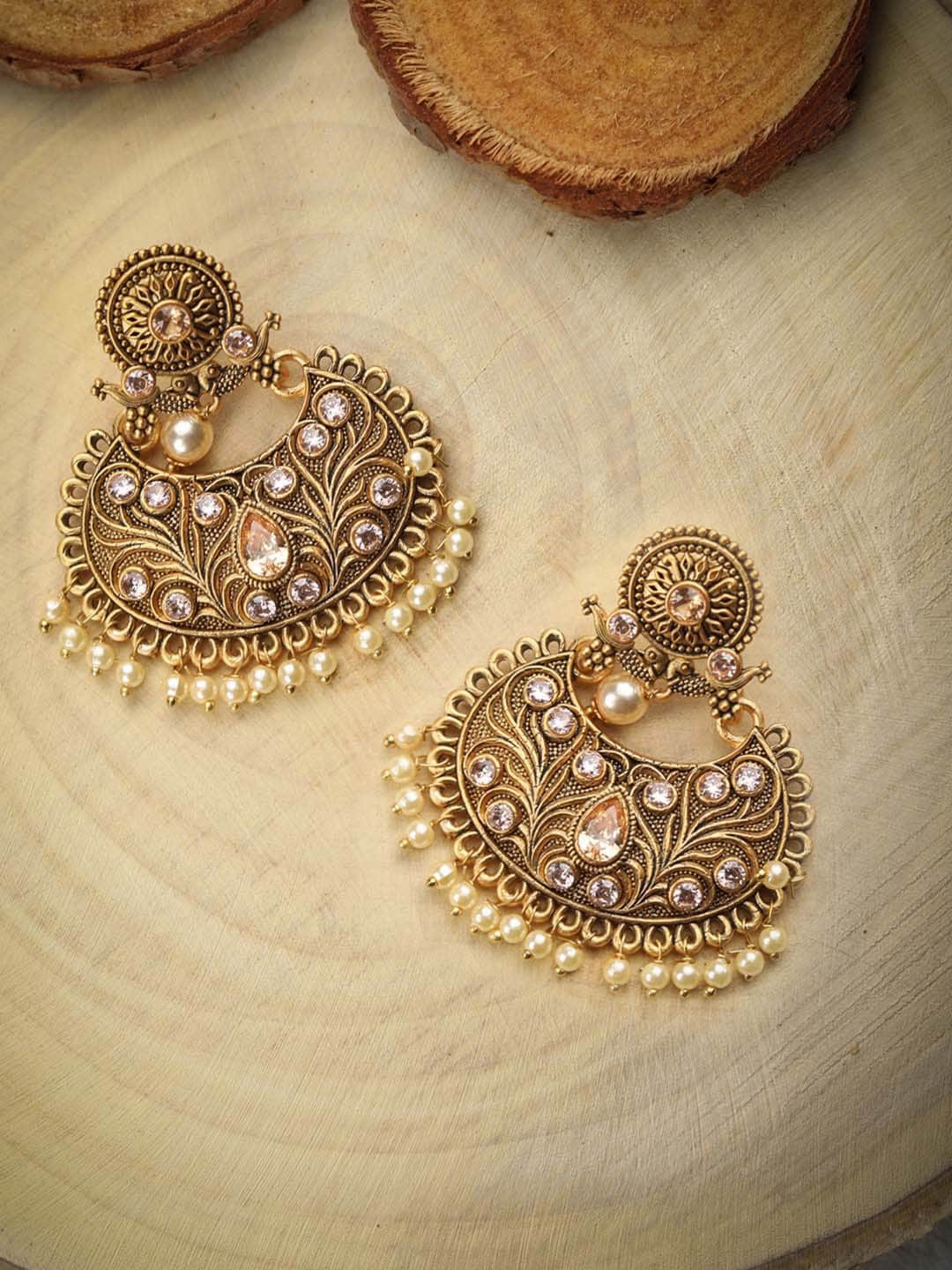 

Priyaasi Gold-Plated & Kundan Studded Crescent Shaped Handcrafted Chandbalis