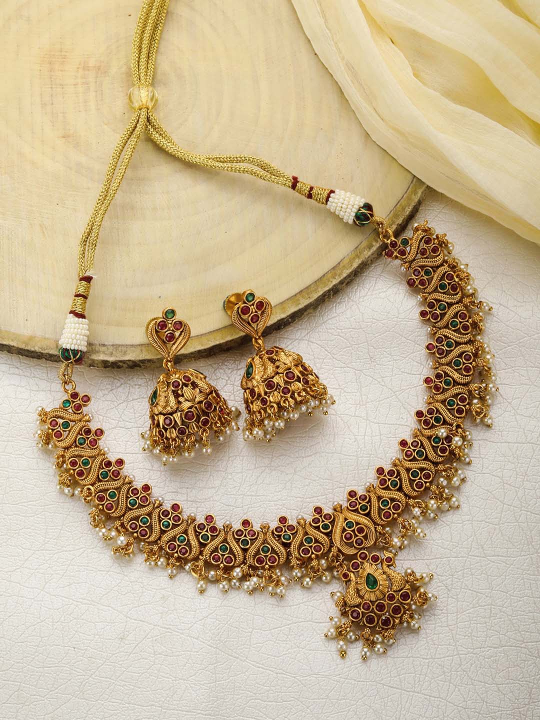 

Priyaasi Gold-Plated Pink & Green Stone-Studded & Beaded Handcrafted Jewellery Set