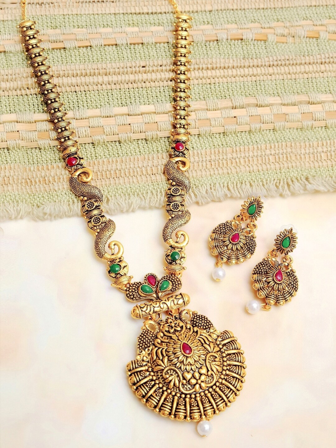 

Crunchy Fashion Gold-Plated Pink & Green Stone-Studded & White Beaded Antique Jewellery Set