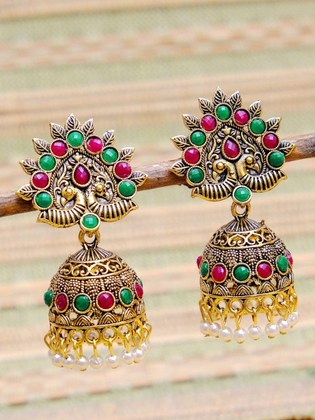 

Crunchy Fashion Gold-Plated Oxidised Antique Peacock Shaped Jhumkas