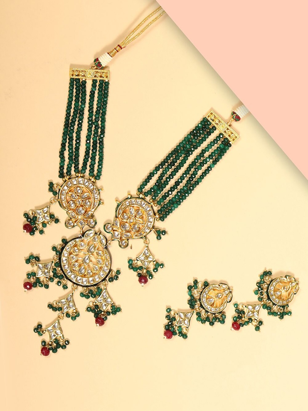 

Priyaasi Gold-Plated White & Green Kundan-Studded Beaded Handcrafted Jewellery Set