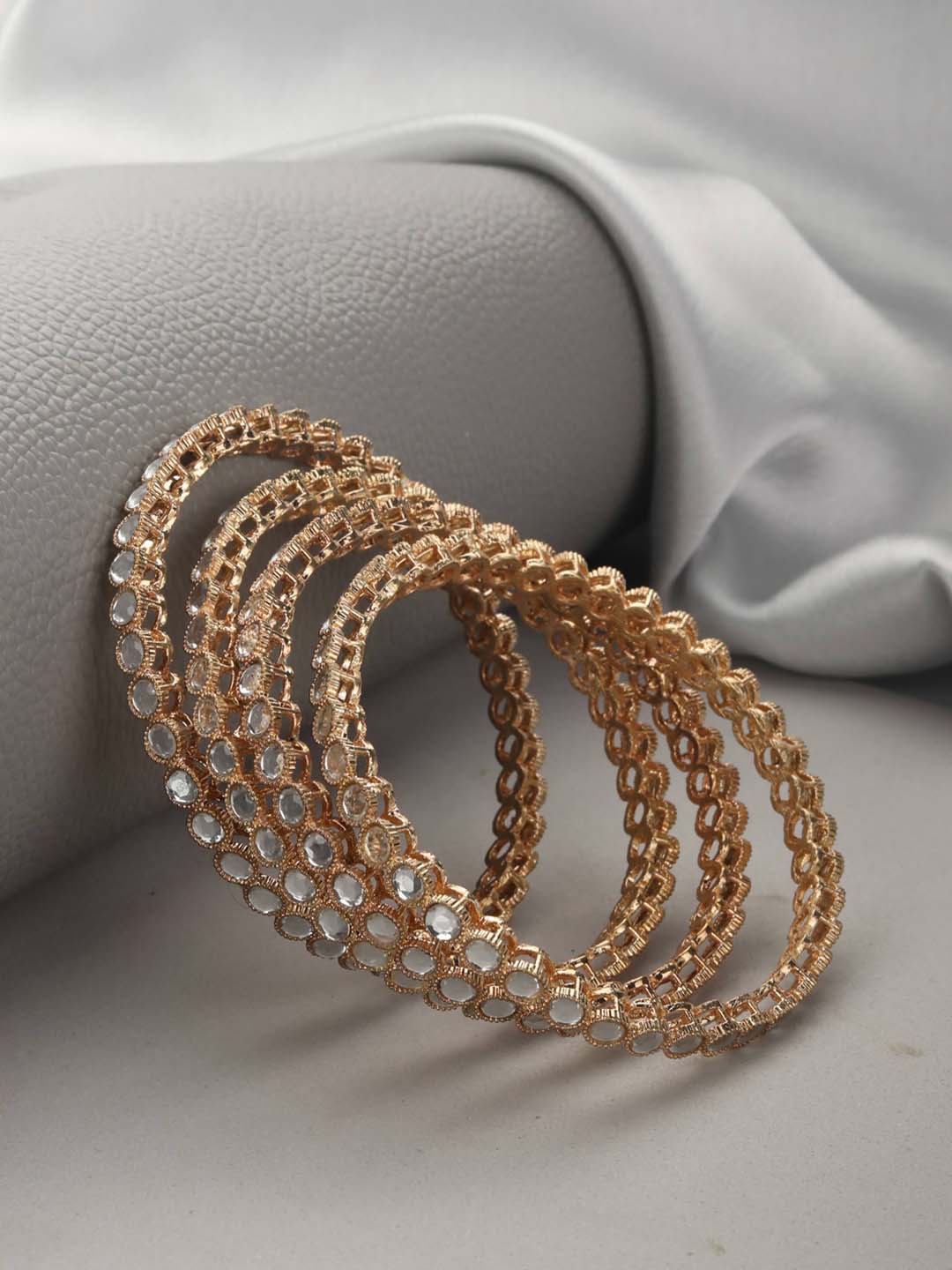 

Priyaasi Set Of 4 Gold-Plated White Kundan-Studded Handcrafted Bangles