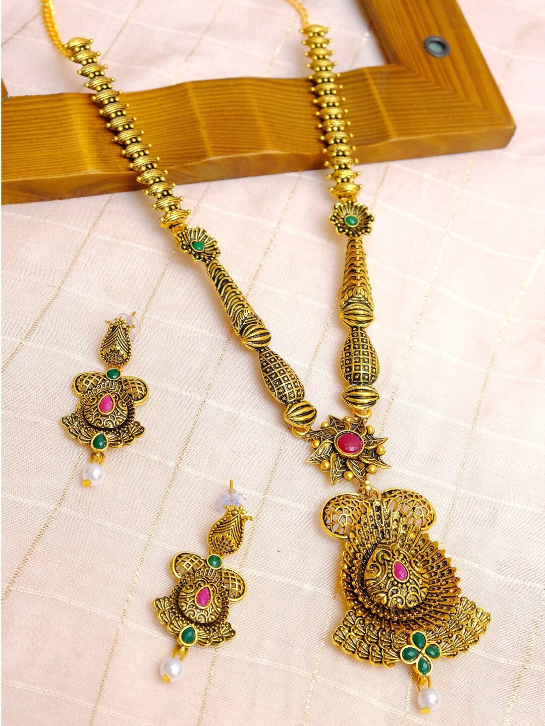 

Crunchy Fashion Gold-Plated Green & Maroon Stone-Studded & Pearl Beaded Antique Jewellery Set