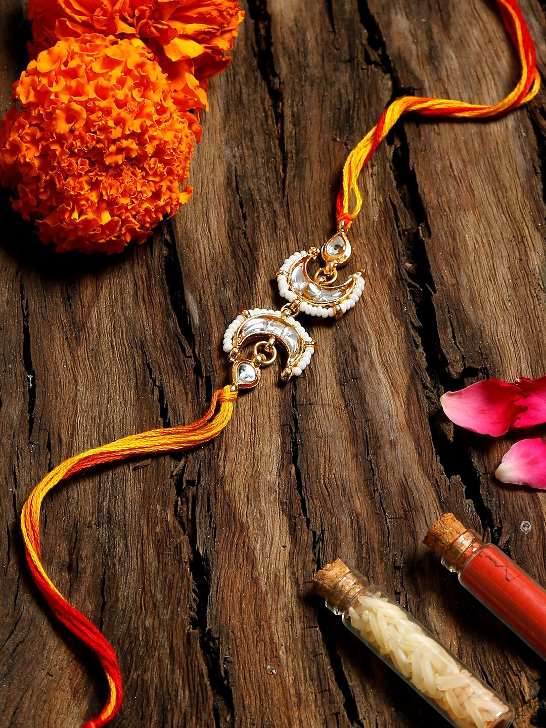 

Ruby Raang Red Kundan Rakhi Gift Box