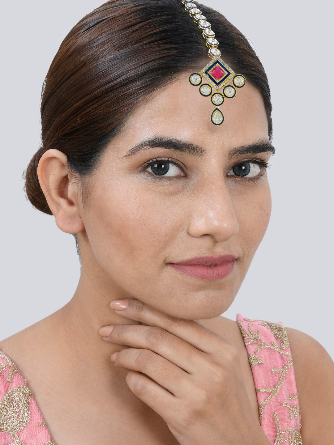 

Silvermerc Designs White & Gold Plated American Diamond Maangtika