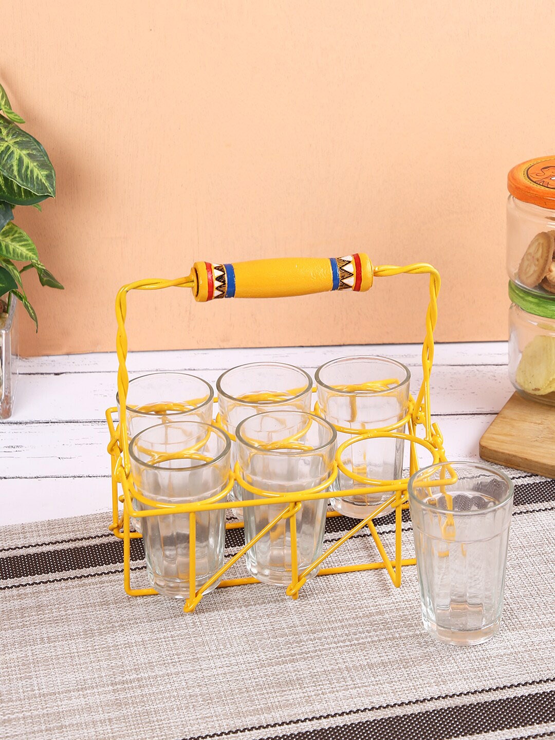 

Aapno Rajasthan Yellow & Transparent Set Of 6 Glasses With Stand