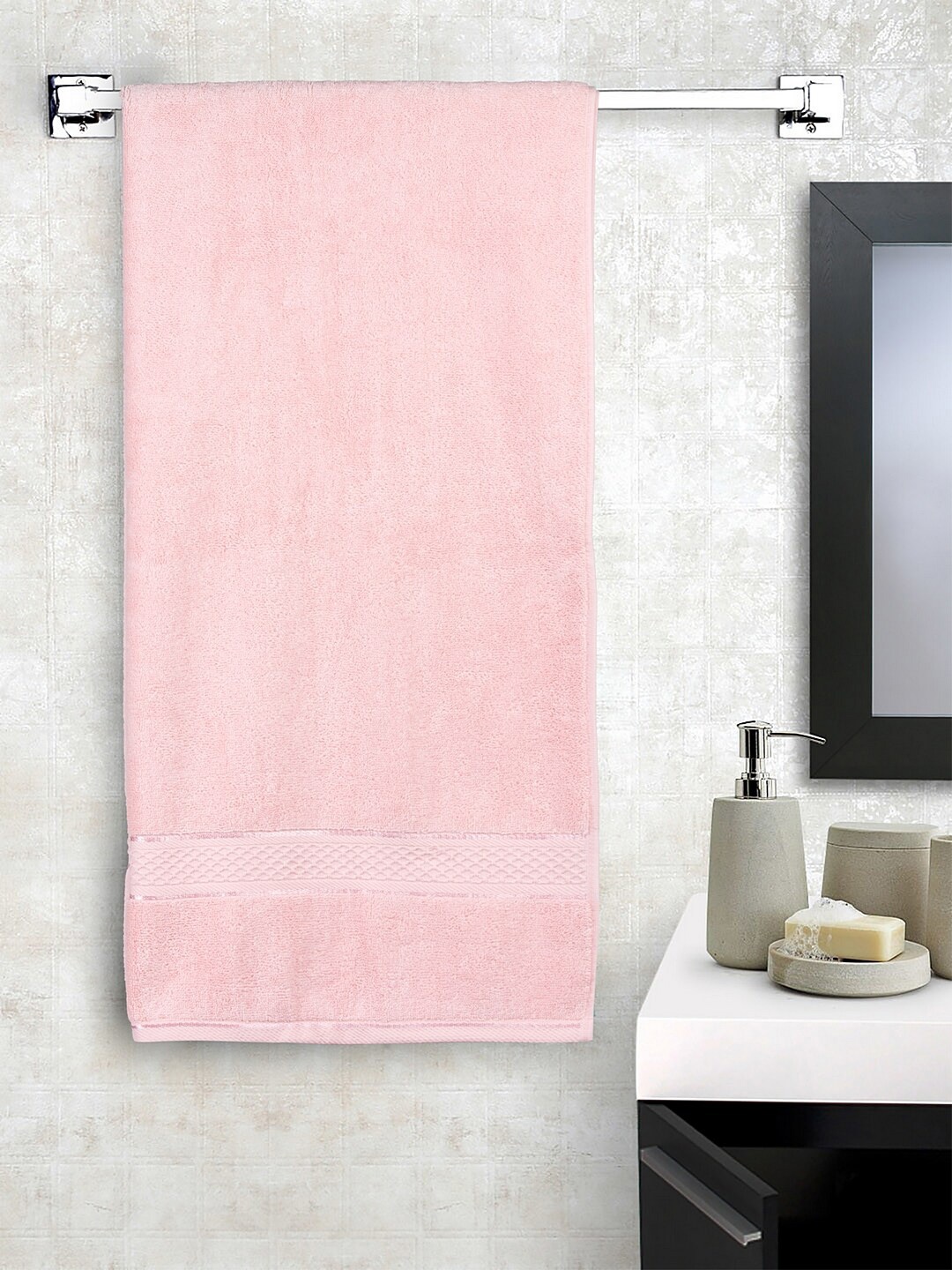 

Trident Pink Solid 600 GSM Pure Cotton Bath Towel