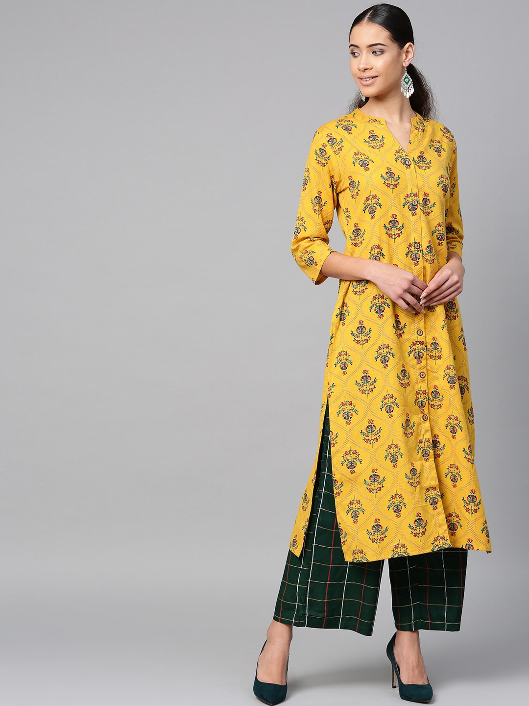 

Sringam Women Mustard Yellow Floral Printed Panelled Pure Cotton Kurta with Palazzos