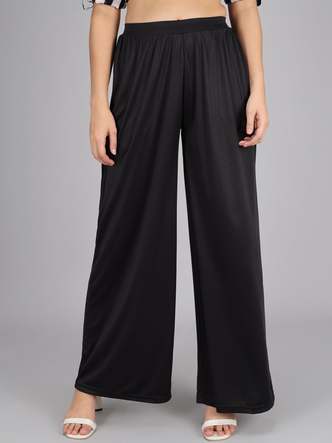 

Kotty Women Black Flared High-Rise Pleated Parallel Trousers