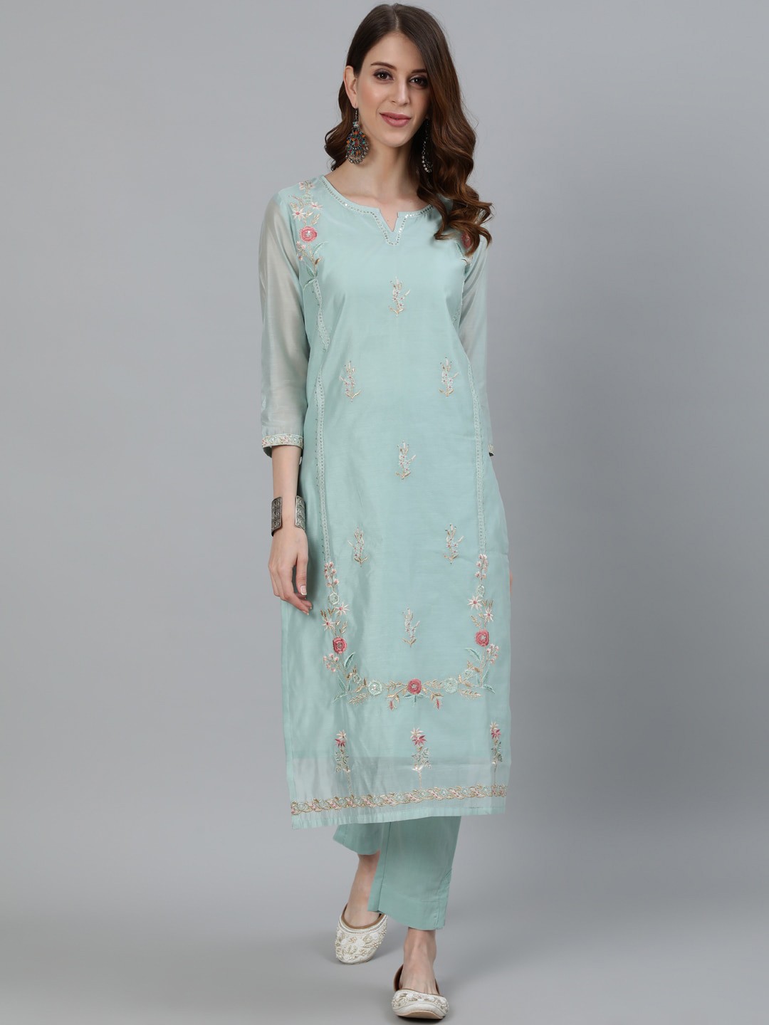 

Ishin Women Green Floral Embroidered Panelled Chanderi Silk Kurti with Trousers