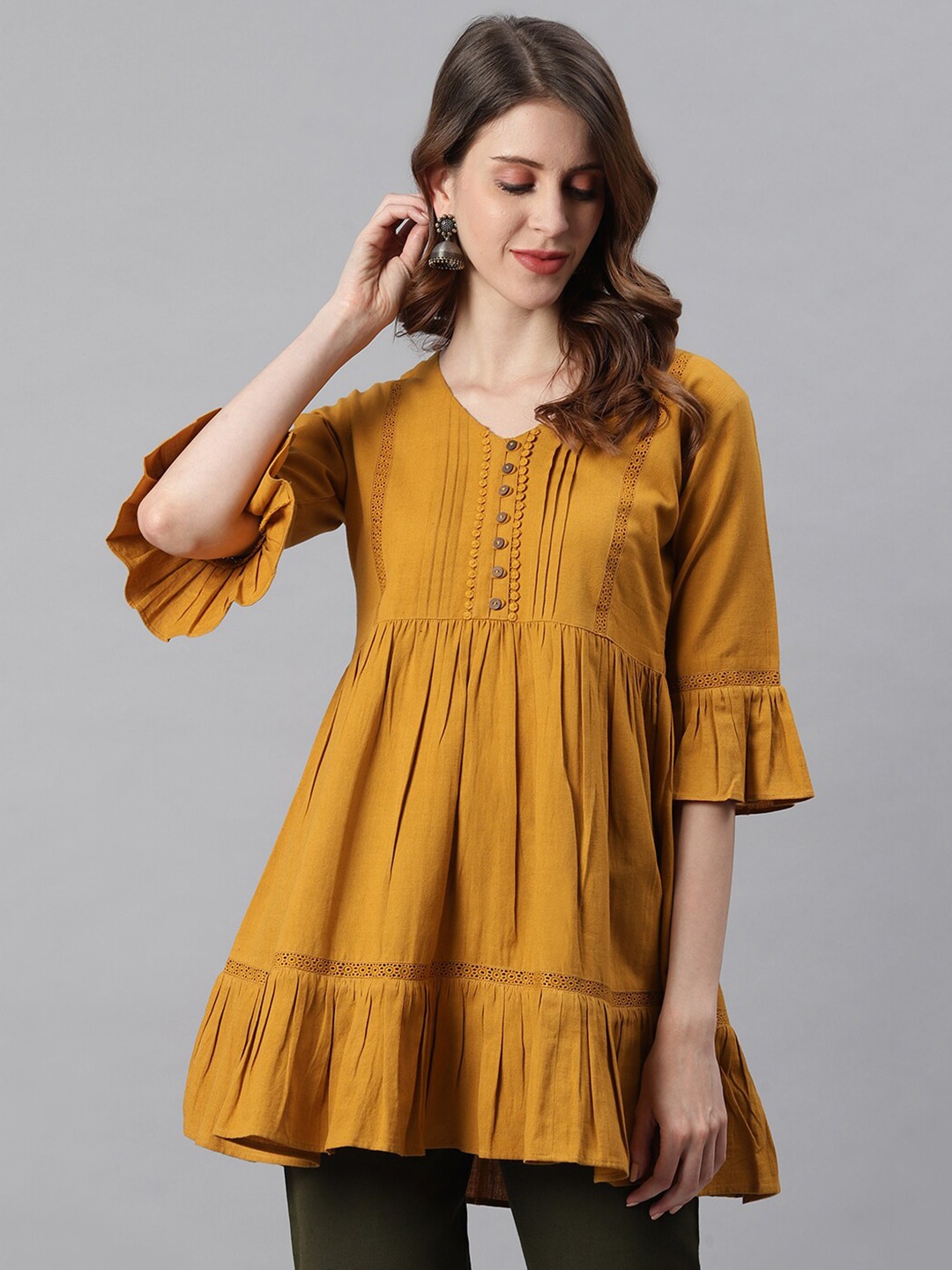 

Janasya Women Mustard Textured Bell Sleeves Tunic