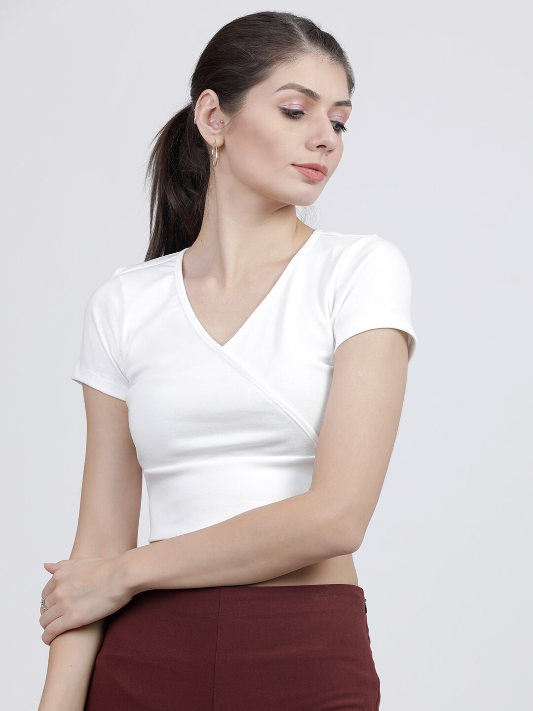 

Tokyo Talkies Women White V-Neck T-shirt